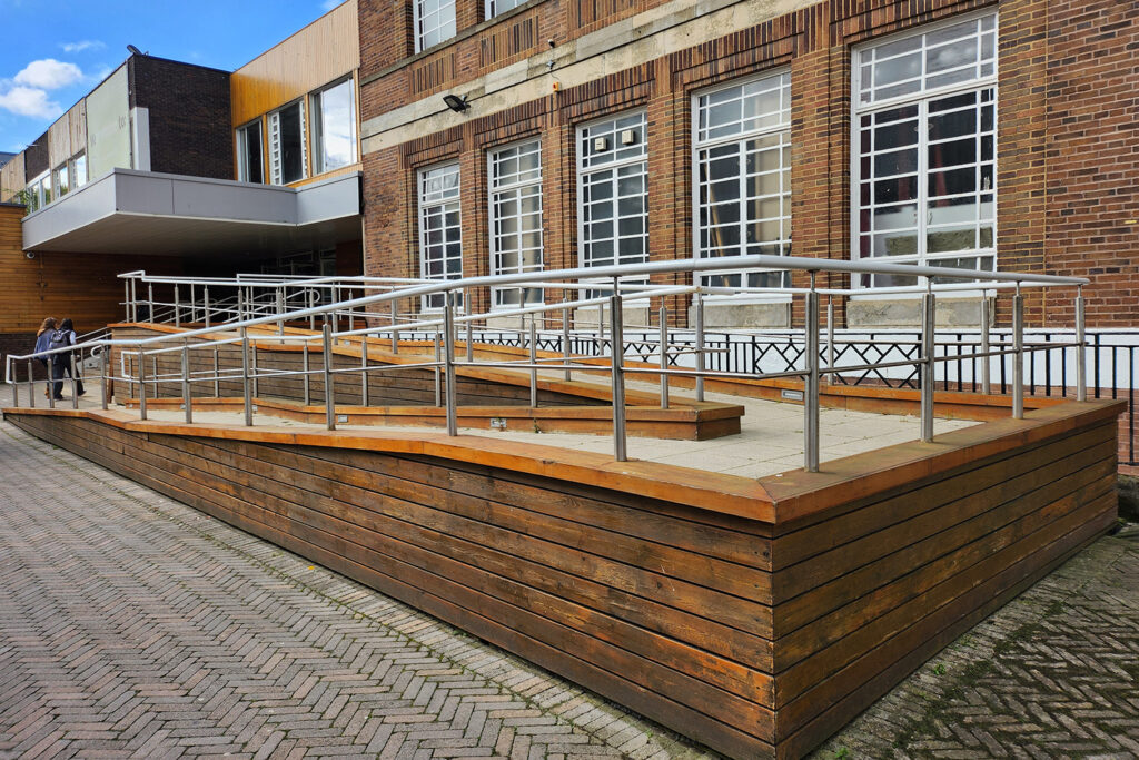 A ramp with metal railings